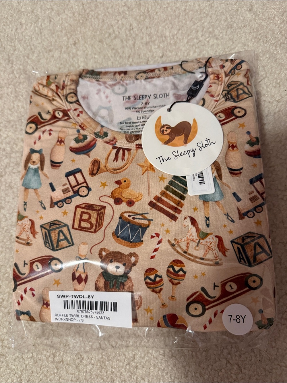 The Sleepy Sloth Kids Ruffle Twirl Dress - Santa’s Workshop